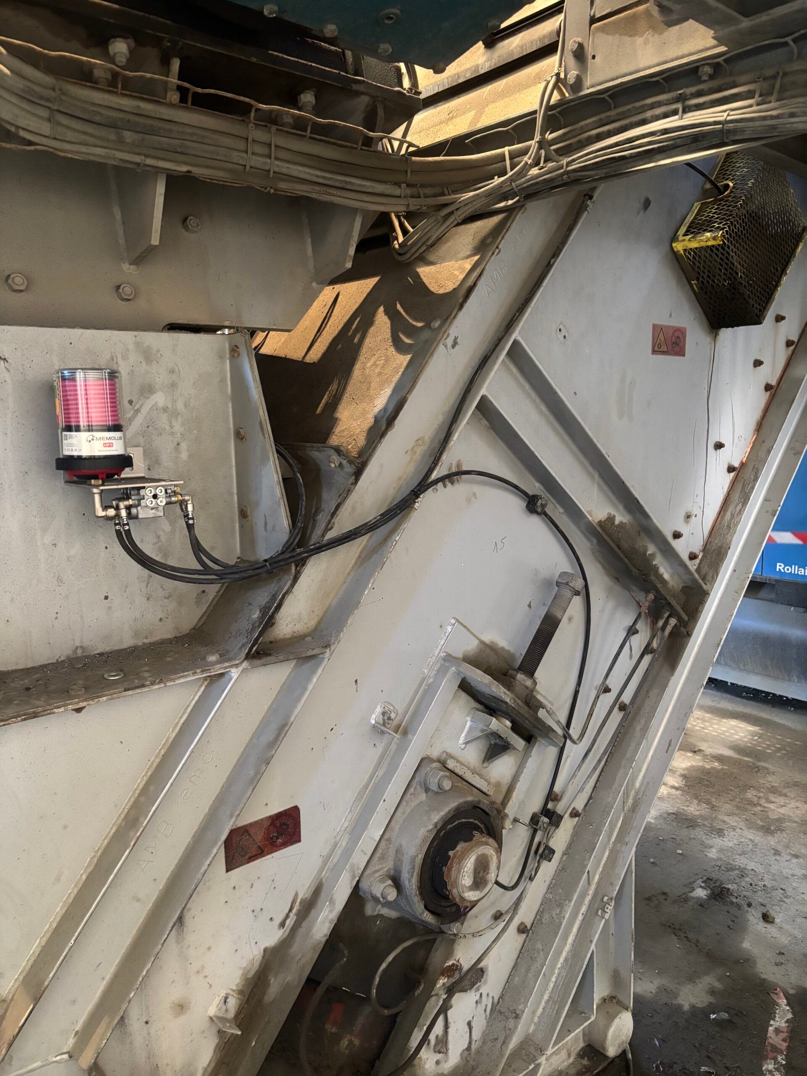 Convoyeur à raclette après mise en place de l’automatisation du graissage des paliers